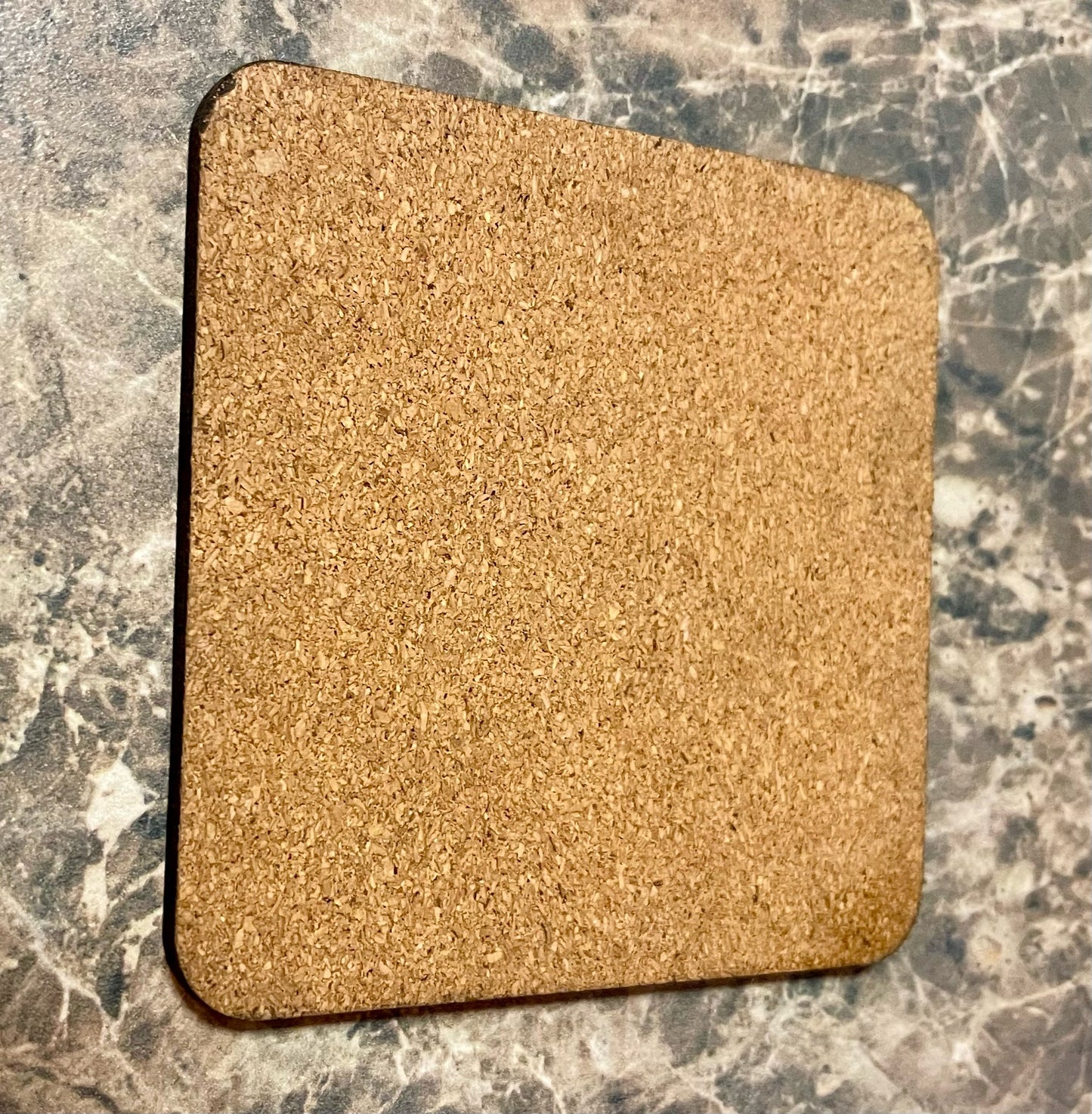 Cork backed wooden coaster