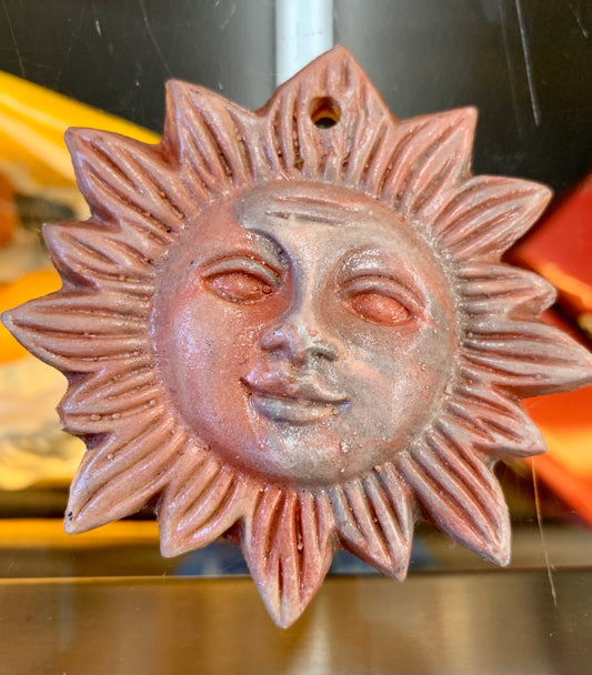 Sun Ornaments by Kicking Bird Pottery